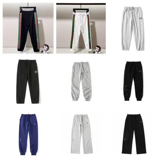 Pantaloni sportivi neri, grigi e blu